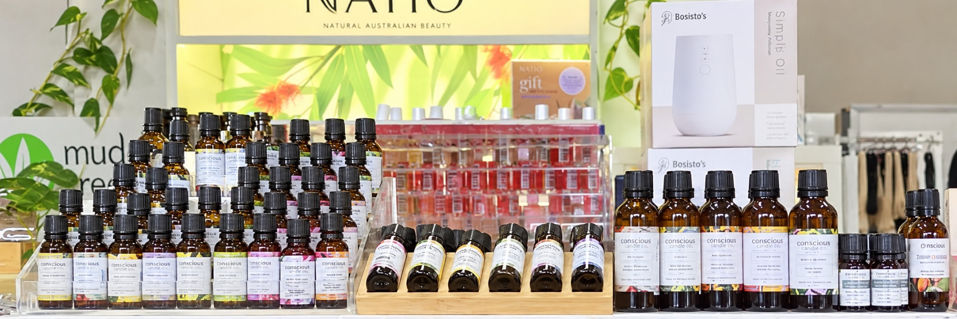 Conscious Candle Co. essential oils and Bosisto's diffusers on display.